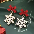 Christmas snowflake drop earrings with red bow and gold trim measuring 3.3cm by 1.8cm - Bow Snowflake Drop (SD61328)