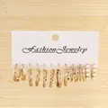 Set of six gold hoop earrings with pearl accents and minimalist textures on jewelry card - Gold 6-Pair Artificial Pearl Simple Hoop Set (FX916)