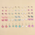 Dettaglio di 30 paia di orecchini misti con farfalle, cuori e perle sintetiche colorate - Stile Pendente Cuore Farfalla Unicorno Colore Caramella (A-42)