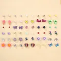 Dettaglio di un set di orecchini a perno colorati con fiori, farfalle e perle miste - Macaron Color Ice Cream Rainbow Unicorn Style (A-47)