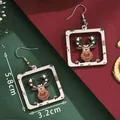 Cartoon Christmas reindeer dangle earrings featuring festive prints and silver hooks - Cartoon Printed Reindeer (SD6101158842316)