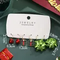 Christmas alloy earrings set with red bells, gift box, and green ribbon bow - Bell Gift Box Bow (SD61348)