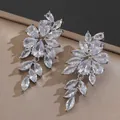Elegant silver drop earrings featuring marquise and pear-cut zircon floral cluster design - Flower Cluster Leaf Dangle Style (7874) / Silver