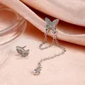 Boucles d'oreilles papillon argentées avec cristaux brillants et chaîne pendante - Gland Argent