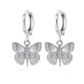 Elegant silver butterfly drop earrings with textured wings on circular hoops - Silver Tone