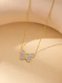 Detailed macro view of a gold-toned butterfly pendant necklace with pavé-set crystals - 18K Gold / Rhinestone Butterfly D1
