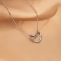 Elegant silver heart pendant necklace with snake chain on premium satin background - Heart Shape Silver Color