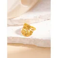 Golden vintage stainless steel leaf ring with an open adjustable design on a white stone - Willow Leaf Shape / Gold