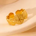 Macro detail of adjustable gold stainless steel ring with sunburst relief and petal edges - Vintage Starburst Relief (#0223)