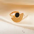 Adjustable gold butterfly ring with black circular insert and hollow fan design - Hollow Black Shell Ring