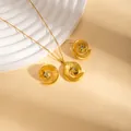 Golden stainless steel jewelry set featuring spiral swirl design with sparkling zircon accents - Jewelry Set (S0060)