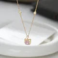 Elegant gold plated cat necklace for women featuring pink gemstone and zircon pendant - Gold