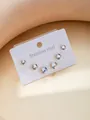 Three pairs of golden stainless steel stud earrings with clear sparkling round zircons - Round Rhinestone Studs Set (BJGE0296)