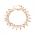 Elegant gold metal anklet with sparkling rhinestone tassels and small bell charm - Circular Charm Rhinestone Style (3659) / Gold