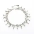 Bohemian silver-tone anklet with sparkling crystal charms and small bell pendant - Circular Ring Rhinestone Style (3660) / Silver