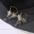 Elegant gold hoop earrings with matte petals, pearls and crystal drop tassels - White Frosted Petal Style / KC Gold