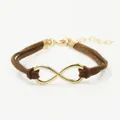 Brown braided leather infinity bracelet with gold-tone metal symbol and lobster clasp - Light Coffee