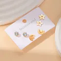 Detail view of gold stainless steel stud earrings set with star and zircon designs - Star Moon Style Set (BJGE0310)
