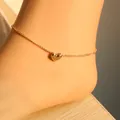 Elegante tobillera dorada con colgante de corazón pulido y cadena fina de moda - Tobillera Dorada S22