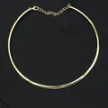 Polished golden punk choker necklace with adjustable lobster clasp on black fabric - Gold