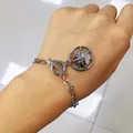 Silver bracelet with chunky chain and round compass pendant featuring an OT toggle clasp - Round Pendant Bracelet with OT Clasp (S87)