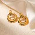 Elegant gold plated stainless steel hoop earrings with vertical striped stud and high polish - Hoop Earrings