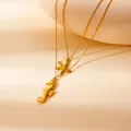 Double-layered golden necklace featuring seahorse and starfish pendants on chain - Double Layer Necklace