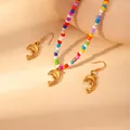 Colorful beaded necklace set with golden dolphin pendant and matching drop earrings - Dolphin (Colorful Bead Set)