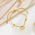 Elegante pulsera de corazón bañada en oro con nácar blanco y cadena ajustable - Pulsera de Oro