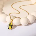 Golden stainless steel necklace with yellow and black enamel tropical fish pendant - Yellow Fish