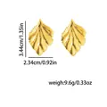 Golden irregular geometric leaf earrings with vintage hammered texture and shiny finish - Leaf Earrings / Gold