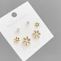 Detail view of s925 silver needle earring set featuring daisy flowers and crystal studs - Three Pair Combination Style / Gold (E783)