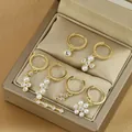 Elegant gold pearl and zircon earring set displayed in a premium jewelry gift box - Gold Style Combination