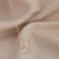 Macro di collana dorata a doppi anelli intrecciati con zirconi cubici scintillanti - Oro