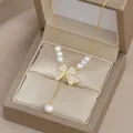 Collana placcata oro con ciondolo a fiocco di cristallo e perle in scatola regalo - Oro