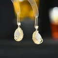 Orecchini a pavone dorati con pietra a goccia bianca e brillanti accenti in zircone - Stile Gancio Pavone (ED62098) / Oro