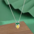 Macro detail of pineapple pendant with yellow pear-cut stone and green heart gems - Pineapple Style (XL62769) / Silver