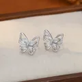Elegantes pendientes de mariposa en plata S925 con circonitas sobre base de tela suave - Plateado (ED69032)