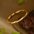 Bracciale rigido aperto a spirale in stile oro antico con motivi tradizionali incisi - Bracciale Rigido Aperto Intreccio Antico (SZ00225) / Oro