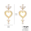 Elegant gold-plated heart drop earrings with white zircon stones and size specifications - Long Heart Rhinestone Style (NCE01252)