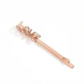 Close-up of rose gold Love letter hair clip with polished metallic finish for women - Rose Gold Letter LOVE Style (NCF00232-1)