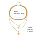 Collier multicouche doré avec pendentifs disques et détail de strass transparent chic - Style Pièce Constellation Capricorne Scorpion (NCN02036)