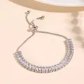 Elegant silver adjustable pull-chain bracelet with sparkling baguette-cut zirconia stones - Silver Baguette Zirconia Sliding Style (NCB00302-2)
