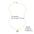 Long golden beaded necklace featuring a circular pendant with white pearls and rhinestones - Long Beaded Pearl Round Plate Pendant Style (NCN00871)