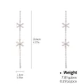 Silver snowflake tassel earrings with cubic zirconia, length 10.6cm and width 1.4cm - Snowflake Tassel Long Drop Style (NCE01073)