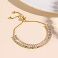 Elegant gold adjustable bracelet featuring rectangular clear gemstones and a bolo clasp - Gold Baguette Zirconia Sliding Style (NCB00302)