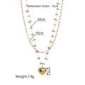 Detail view of 18K gold stainless steel heart pendant and colorful stone beads layer - 2185-ax / Double Layer Heart Necklace