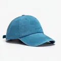 Classic navy blue washed canvas baseball cap with adjustable strap in a 45-degree side view - Blank Style / Lake Blue