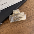 Rectangular taupe marble acetate hair claw clip with a gold metal spring for styling - Fog Grey