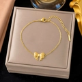 Elegant gold bow charm bracelet in stainless steel with adjustable lobster clasp - SLE2097 Bow Bracelet Gold
